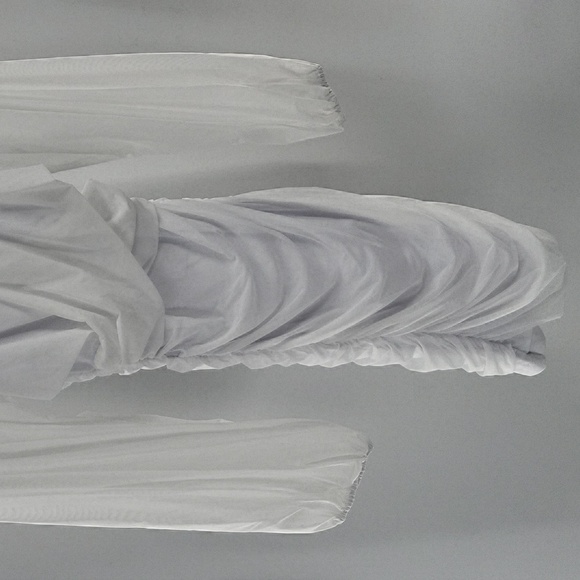 Elegant White Dress With Semi Transparent Sleeves - Picture 11 of 16